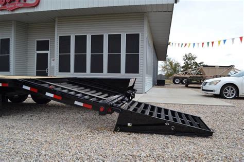 low profile equipment trailer with full width monster ramps